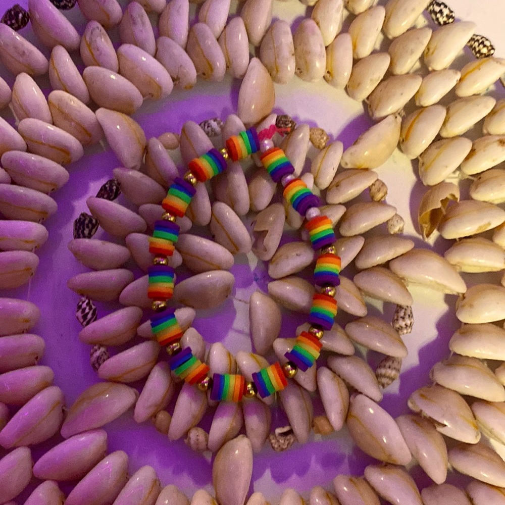 Selling a rainbow beaded bracelet for $7